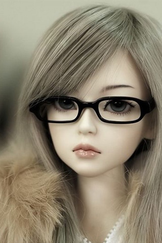 muñeca bonita con gafas
